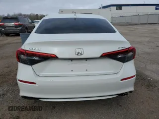 2022 Honda Civic Sport z VIN 2HGFE2F53NH119210, wystawiony jako Copart lot #51692345 z przebiegiem 58 785 mil mil oraz Szkoda całkowita • Salvage title. Historia ofert i sprzedaży dostępna na DreamBid. Obrazek 6.