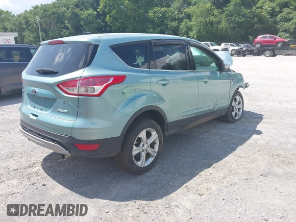 2013 Ford Escape SE with VIN 1FMCU9G98DUB92921, listed as a IAAI auction lot 42618998 with 135,497 mi miles and . Bid and sale history available at DreamBid. Image 4.
