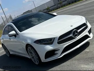 2019 Mercedes-Benz CLS with VIN WDD2J5JB0KA015104, listed as a IAAI auction lot 42108693 with 59,102 mi miles. Bid and sale history available at carsss.com. Image 1.
