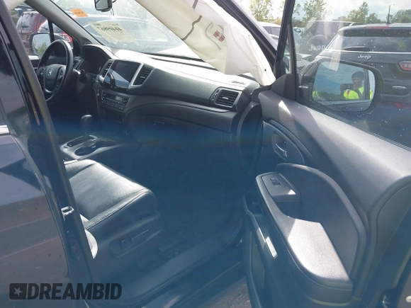 2016 Honda Pilot EX-L with VIN 5FNYF6H5XGB031594, listed as a IAAI auction lot 40409867 with 132,227 mi miles. Bid and sale history available at carsss.com. Image 5.