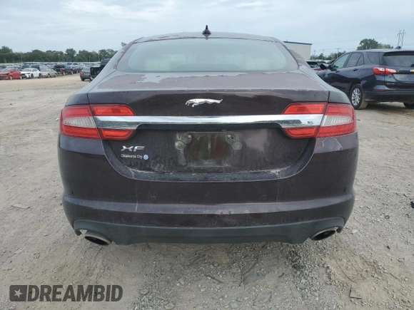 2013 Jaguar XF I4 RWD with VIN SAJWA0ES9DPU02213, listed as a Copart auction lot 69713934 with 104,088 mi miles and Salvage Title. Bid and sale history available at carsss.com. Image 6.