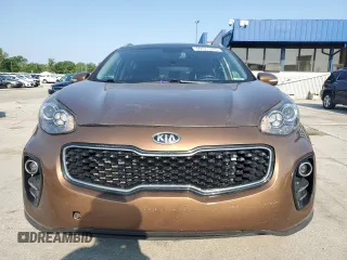 2017 Kia Sportage EX with VIN KNDPNCAC9H7054281, listed as a Copart auction lot 60571945 with 106,516 mi miles and Salvage title. Bid and sale history available at DreamBid. Image 5.