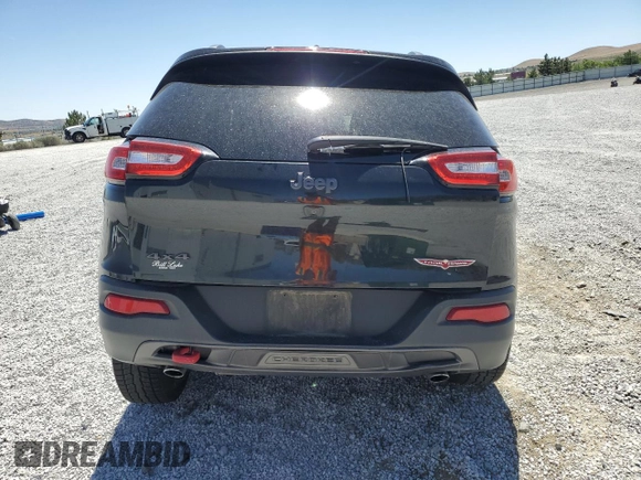 2016 Jeep Cherokee Trailhawk с VIN 1C4PJMBS8GW352316, выставлен на аукционе Copart как лот 62519365 с пробегом 128 576 миль миль и Списание • Salvage title. История ставок и продаж доступна на DreamBid. Изображение 6.