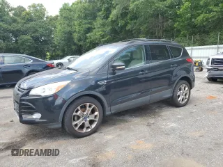 2013 Ford Escape SEL with VIN 1FMCU0HX6DUB66021, listed as a Copart auction lot 63814635 with 129,691 mi miles and Clean title. Bid and sale history available at DreamBid. Image 1.