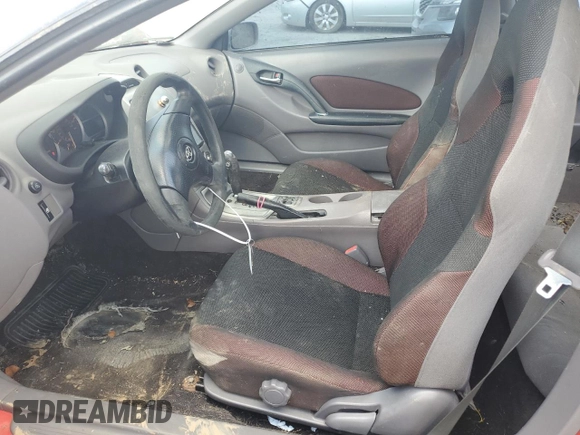 2000 Toyota Celica GT with VIN JTDDR32T1Y0021547, listed as a Copart auction lot 74622334 with 374,197 mi miles and Salvage Title. Bid and sale history available at carsss.com. Image 7.