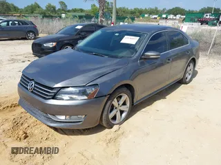 2015 Volkswagen Passat S with VIN 1VWAS7A38FC082760, listed as a IAAI auction lot 42156013 with 199,450 mi miles and . Bid and sale history available at DreamBid. Image 2.