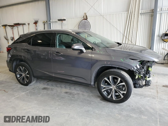 2016 Lexus RX 350 with VIN 2T2BZMCA1GC038794, listed as a Copart auction lot 64048765 with 114,205 mi miles and Salvage title. Bid and sale history available at DreamBid. Image 4.