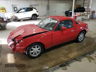 1993 Mazda MX-5 Miata z VIN JM1NA3515P0412818, wystawiony jako Copart lot #55136955 z przebiegiem 160 398 mil mil oraz Szkoda całkowita • Salvage title. Historia ofert i sprzedaży dostępna na DreamBid. Obrazek 1.