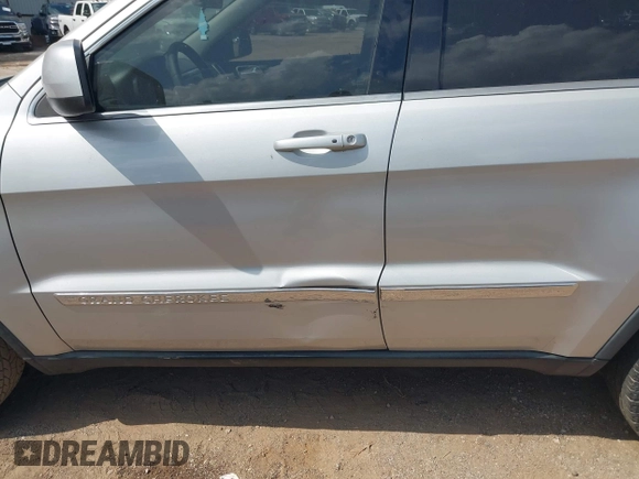 2012 Jeep Grand Cherokee Laredo with VIN 1C4RJEAG4CC251359, listed as a IAAI auction lot 41986762 with 172,331 mi miles. Bid and sale history available at carsss.com. Image 6.