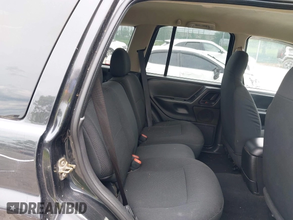 2004 Jeep Grand Cherokee Laredo z VIN 1J4GW48S54C198115, wystawiony jako IAAI lot #42351240 z przebiegiem 189 416 mil mil oraz . Historia ofert i sprzedaży dostępna na DreamBid. Obrazek 8.
