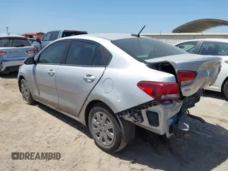 2023 Kia Rio S z VIN 3KPA24AD6PE600384, wystawiony jako IAAI lot #42003099 z przebiegiem 27 001 mil mil oraz . Historia ofert i sprzedaży dostępna na DreamBid. Obrazek 3.