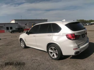 2014 BMW X5 xDrive35i with VIN 5UXKR0C56E0H18800, listed as a IAAI auction lot 40843200 with 129,991 mi miles. Bid and sale history available at carsss.com. Image 3.