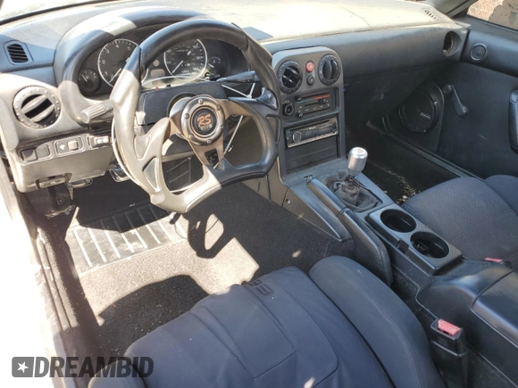 1990 Mazda MX-5 Miata z VIN JM1NA3511L0106323, wystawiony jako Copart lot #50449685 z przebiegiem 179 018 mil mil oraz Szkoda całkowita • Salvage title. Historia ofert i sprzedaży dostępna na DreamBid. Obrazek 8.