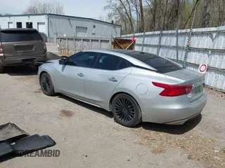 2016 Nissan Maxima SV z VIN 1N4AA6APXGC383279, wystawiony jako IAAI lot #42144003 z przebiegiem 141 099 mil mil oraz . Historia ofert i sprzedaży dostępna na DreamBid. Obrazek 3.