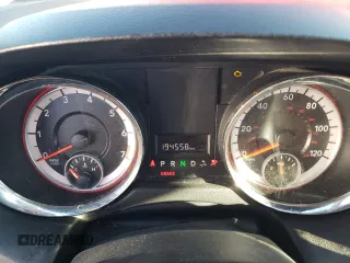 2013 Dodge Grand Caravan SE with VIN 2C4RDGBG9DR598549, listed as a Copart auction lot 86330734 with 194,558 mi miles and Salvage Title. Bid and sale history available at DreamBid. Image 9.