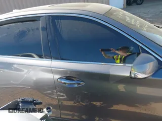 2015 Infiniti Q50 Premium with VIN JN1BV7AP3FM358244, listed as a IAAI auction lot 42063278 with 98,873 mi miles and . Bid and sale history available at DreamBid. Image 14.