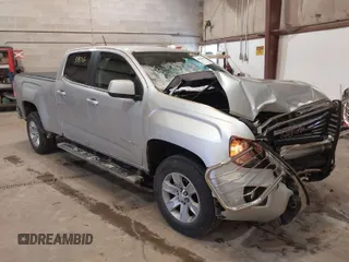 2015 GMC Canyon 4WD SLE with VIN 1GTG6BE36F1124627, listed as a IAAI auction lot 41623806 with 104,182 mi miles and . Bid and sale history available at carsss.com. Image 1.