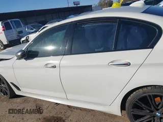 2018 BMW 5 Series M550i xDrive with VIN WBAJB9C54JB050218, listed as a IAAI auction lot 41132695 with 69,659 mi miles. Bid and sale history available at carsss.com. Image 13.