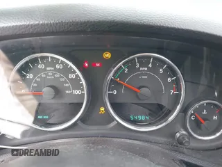 2013 Jeep Wrangler Rubicon 10th Anniversary with VIN 1C4BJWCG3DL591186, listed as a IAAI auction lot 41315969 with 54,984 mi miles and . Bid and sale history available at DreamBid. Image 7.
