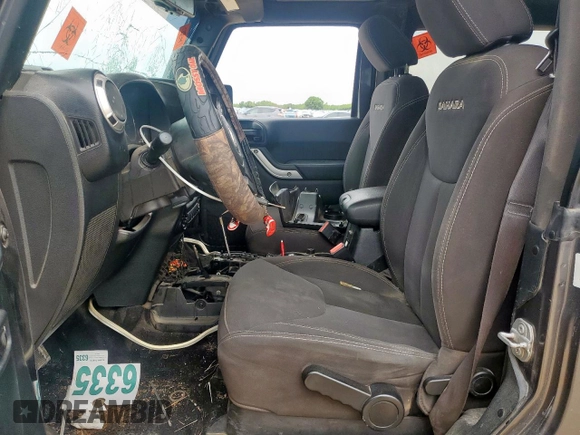 2017 Jeep Wrangler Sahara with VIN 1C4AJWBG4HL670837, listed as a Copart auction lot 60639525 with 153,049 mi miles and Salvage title. Bid and sale history available at DreamBid. Image 7.