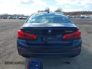 2018 BMW 5 Series M550i xDrive with VIN WBAJB9C52JB035930, listed as a IAAI auction lot 41674415 with 56,294 mi miles and . Bid and sale history available at DreamBid. Image 16.