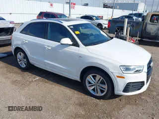 2018 Audi Q3 Premium with VIN WA1BCCFS8JR001155, listed as a IAAI auction lot 41157028 with 83,769 mi miles. Bid and sale history available at carsss.com. Image 1.