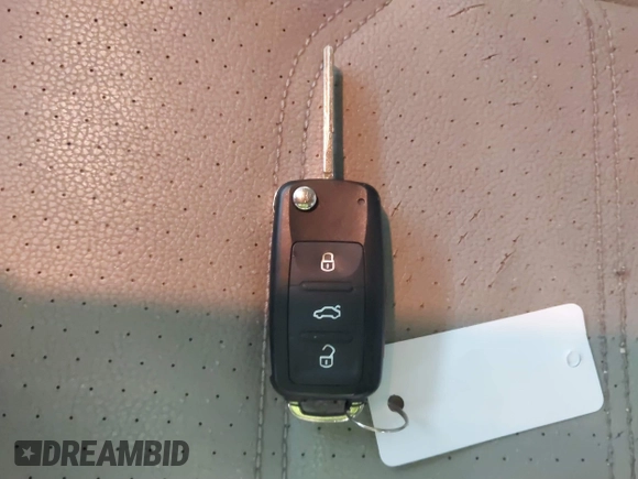 2012 Volkswagen Passat SE with VIN 1VWBH7A38CC053564, listed as a IAAI auction lot 41488237 with 188,636 mi miles and . Bid and sale history available at DreamBid. Image 11.