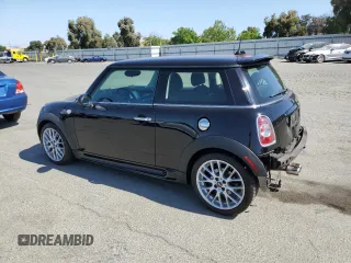 2011 MINI Hardtop S with VIN WMWSV3C57BTY16043, listed as a Copart auction lot 59337575 with 84,617 mi miles and Salvage title. Bid and sale history available at DreamBid. Image 2.