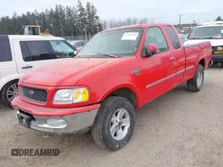 1998 Ford F-150 with VIN 1FTRX18L6WKB01340, listed as a IAAI auction lot 41566198 with 199,223 mi miles and . Bid and sale history available at DreamBid. Image 2.