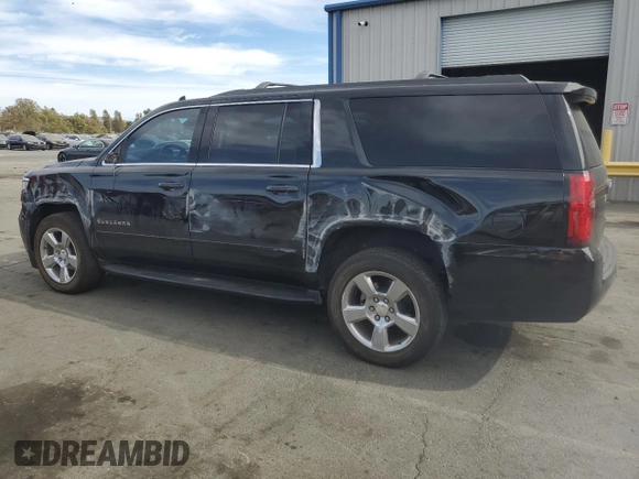 2019 Chevrolet Suburban LS z VIN 1GNSCGKC2KR297407, wystawiony jako Copart lot #75224194 z przebiegiem 93 562 mil mil oraz Szkoda całkowita • Salvage title. Historia ofert i sprzedaży dostępna na DreamBid. Obrazek 2.