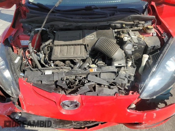 2014 Mazda 2 Sport z VIN JM1DE1KZ7E0186633, wystawiony jako Copart lot #59354705 z przebiegiem 111 234 mil mil oraz Szkoda całkowita • Salvage title. Historia ofert i sprzedaży dostępna na DreamBid. Obrazek 11.