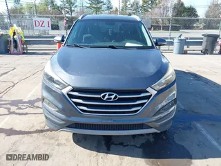 2017 Hyundai Tucson Value with VIN KM8J33A25HU402366, listed as a IAAI auction lot 41814426 with 117,669 mi miles. Bid and sale history available at carsss.com. Image 12.