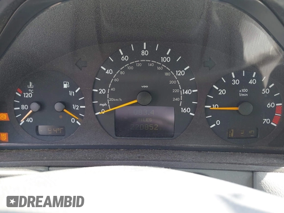 2002 Mercedes-Benz E-Class with VIN WDBJF65J22B432263, listed as a IAAI auction lot 42130545 with 220,852 mi miles. Bid and sale history available at carsss.com. Image 7.