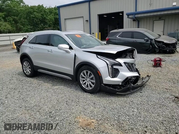 2021 Cadillac XT4 FWD Premium Luxury z VIN 1GYFZCR40MF000293, wystawiony jako Copart lot #54237315 z przebiegiem 49 721 mil mil oraz Szkoda całkowita • Salvage title. Historia ofert i sprzedaży dostępna na DreamBid. Obrazek 13.