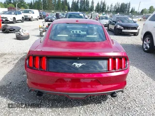 2016 Ford Mustang EcoBoost z VIN 1FA6P8TH5G5333819, wystawiony jako IAAI lot #42327887 z przebiegiem 124 870 mil mil oraz . Historia ofert i sprzedaży dostępna na DreamBid. Obrazek 16.