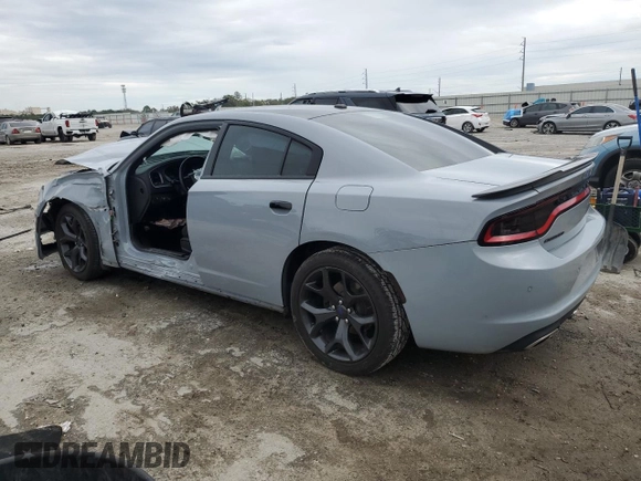 2020 Dodge Charger SXT with VIN 2C3CDXBG6LH192727, listed as a Copart auction lot 46730295 with 58,664 mi miles and Salvage Title. Bid and sale history available at DreamBid. Image 2.