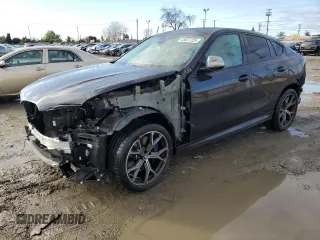 2023 BMW X6 M50i with VIN 5UXCY8C07P9P36454, listed as a Copart auction lot 43837225 with 12,848 mi miles and Salvage Title. Bid and sale history available at carsss.com. Image 1.