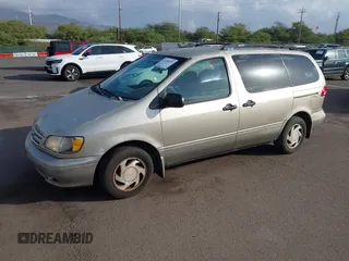 2002 Toyota Sienna LE with VIN 4T3ZF13C82U457803, listed as a IAAI auction lot 41198246 with 185,445 mi miles and . Bid and sale history available at DreamBid. Image 2.