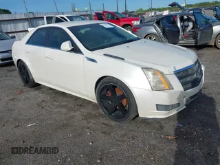 2010 Cadillac CTS Luxury with VIN 1G6DE5EG9A0140090, listed as a IAAI auction lot 42086562 with 230,280 mi miles. Bid and sale history available at carsss.com. Image 1.