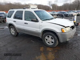2002 Ford Escape XLT Choice with VIN 1FMYU04142KD82594, listed as a IAAI auction lot 41574646 with 173,174 mi miles. Bid and sale history available at carsss.com. Image 1.