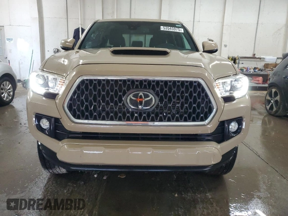 2019 Toyota Tacoma SR z VIN 3TMCZ5AN1KM285074, wystawiony jako Copart lot #53545975 z przebiegiem 53 838 mil mil oraz Szkoda całkowita • Salvage title. Historia ofert i sprzedaży dostępna na DreamBid. Obrazek 5.