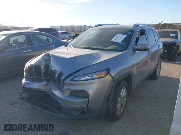 2015 Jeep Cherokee Latitude z VIN 1C4PJMCS3FW673872, wystawiony jako IAAI lot #41778031 z przebiegiem 173 845 mil mil oraz . Historia ofert i sprzedaży dostępna na DreamBid. Obrazek 17.