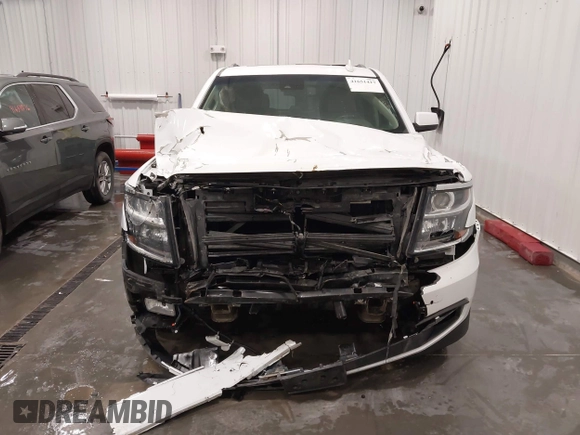 2020 Chevrolet Suburban LT with VIN 1GNSKHKC5LR108971, listed as a IAAI auction lot 41651417 with 90,674 mi miles. Bid and sale history available at carsss.com. Image 12.