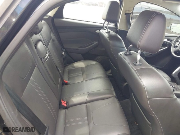 2012 Ford Focus Titanium with VIN 1FAHP3J2XCL369554, listed as a IAAI auction lot 42072931 with 95,474 mi miles. Bid and sale history available at carsss.com. Image 8.