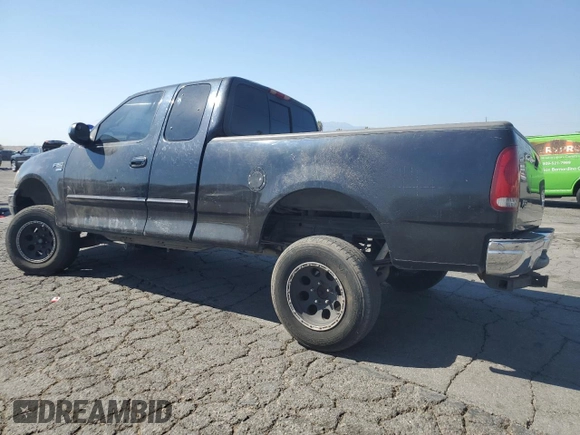2000 Ford F-150 XL with VIN 1FTRX17W7YKB44552, listed as a Copart auction lot 72790504 with 0 mi miles and Salvage Title. Bid and sale history available at carsss.com. Image 2.