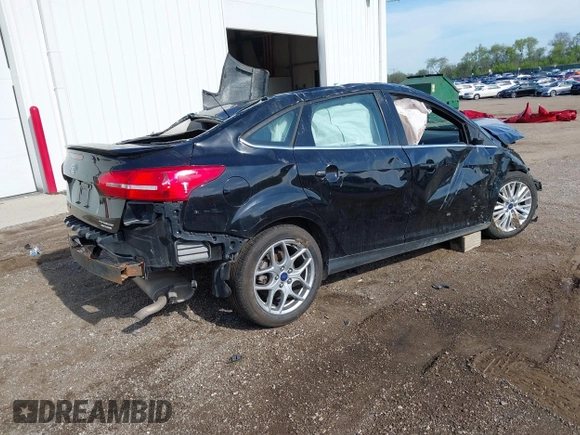 2016 Ford Focus Titanium with VIN 1FADP3J22GL242818, listed as a IAAI auction lot 42177015 with Not provided miles and . Bid and sale history available at DreamBid. Image 4.