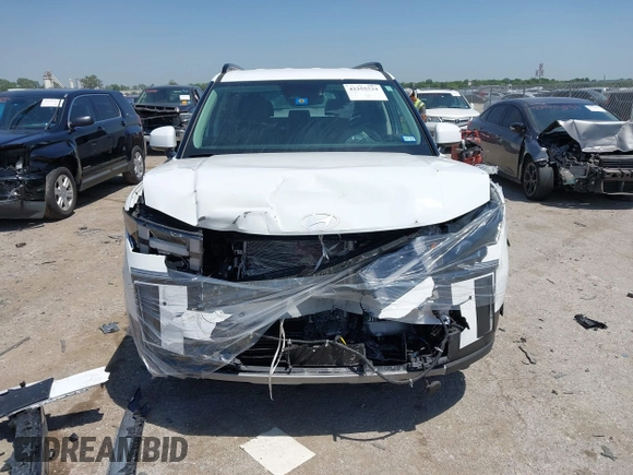 2025 Hyundai Santa Fe SEL z VIN 5NMP24GL5SH076185, wystawiony jako IAAI lot #42255534 z przebiegiem 5 521 mil mil oraz . Historia ofert i sprzedaży dostępna na DreamBid. Obrazek 12.