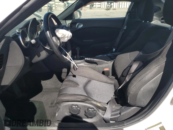 2014 Nissan 370Z Nismo with VIN JN1AZ4EH2EM633022, listed as a Copart auction lot 46947575 with 115,042 mi miles and Salvage Title. Bid and sale history available at DreamBid. Image 7.