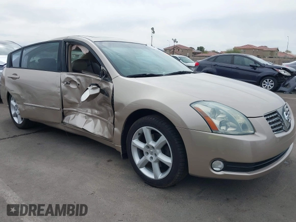 2004 Nissan Maxima SE with VIN 1N4BA41EX4C927086, listed as a IAAI auction lot 41734539 with 135,331 mi miles and . Bid and sale history available at DreamBid. Image 6.