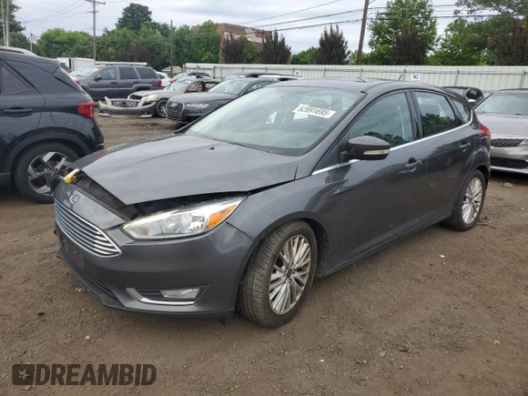 2017 Ford Focus Titanium z VIN 1FADP3N29HL240527, wystawiony jako Copart lot #62891695 z przebiegiem 126 926 mil mil oraz Szkoda całkowita • Salvage title. Historia ofert i sprzedaży dostępna na DreamBid. Obrazek 1.